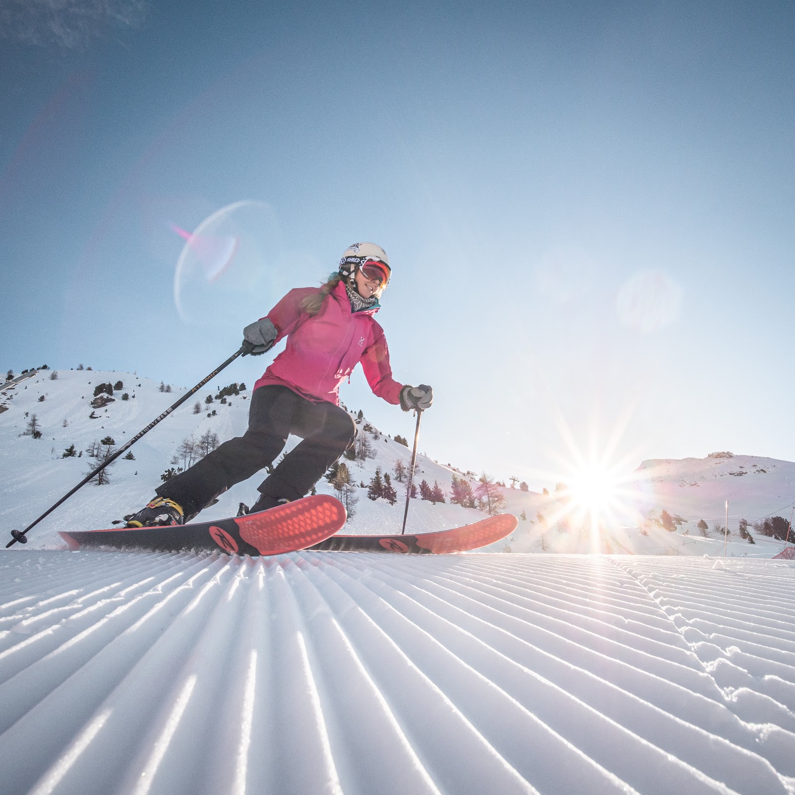 Skiers on the long cruising runs of Val Cenis in the Haute Maurienne