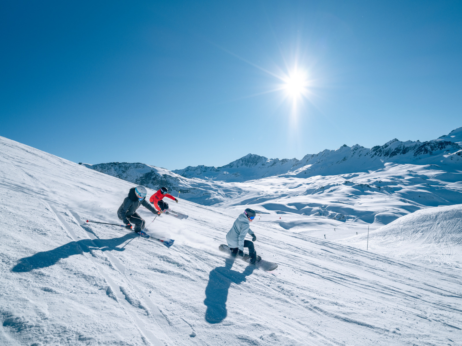 The high French ski resort of Val d'Isere under deep snow with peaks behind