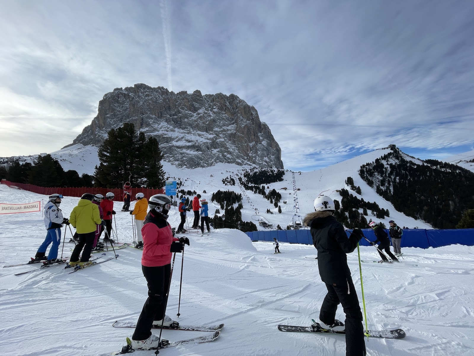 Gondola rising from Selva toward Ciampinoi under blue sky