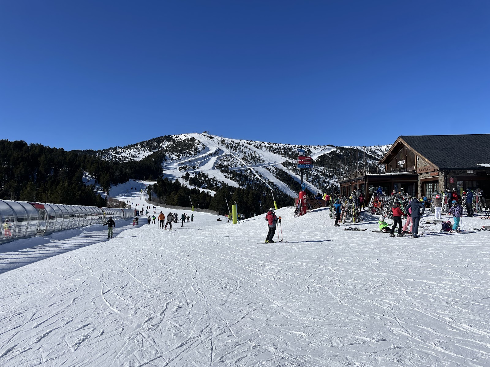 The village of Arinsal beneath snowy Pyrenees slopes in Andorra