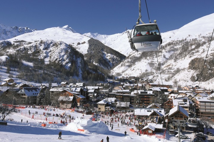Valloire village and its baroque church under snow