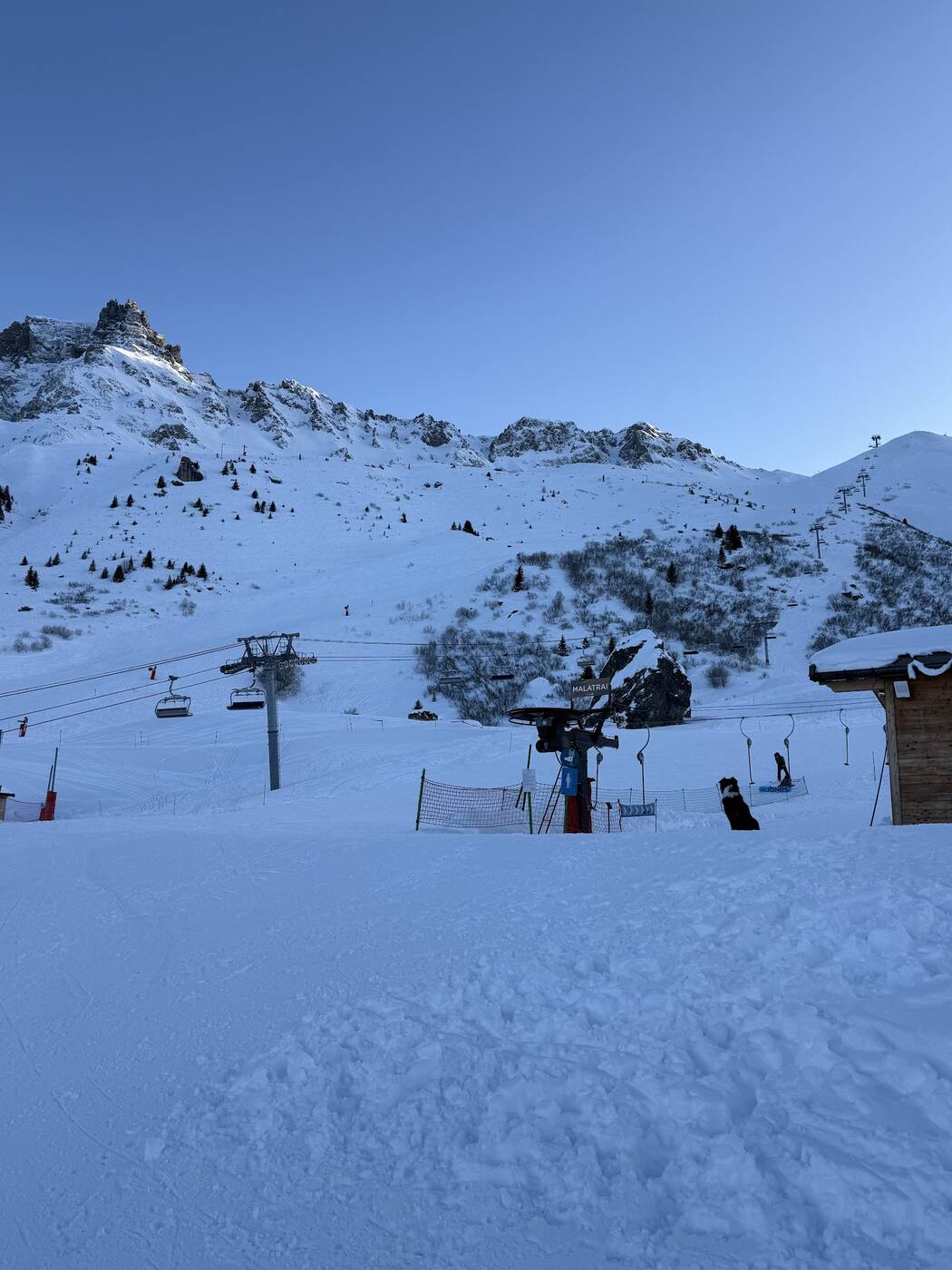 Skiers returning to the village base of Valmorel