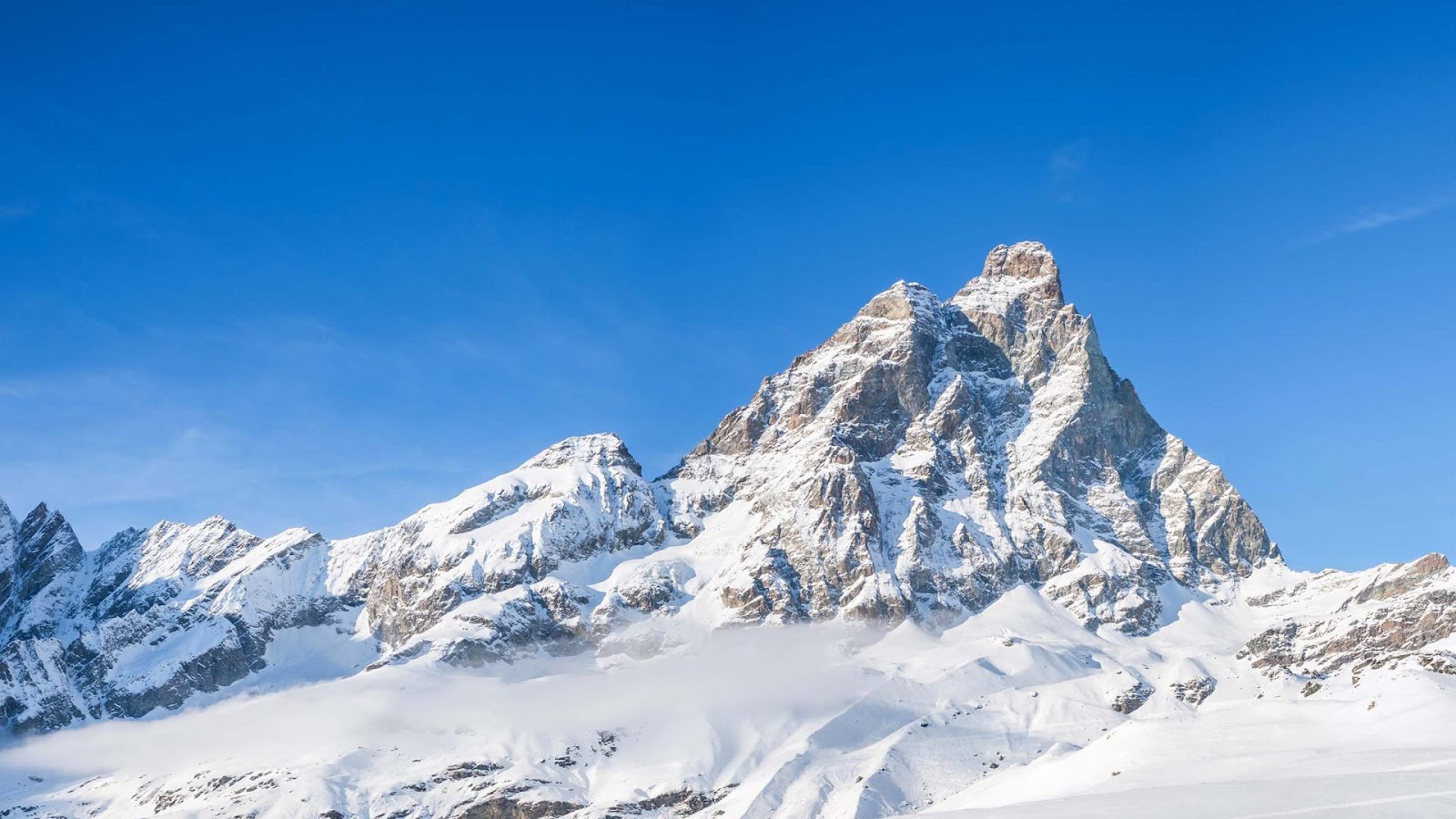 The village of Valtournenche under snowy peaks