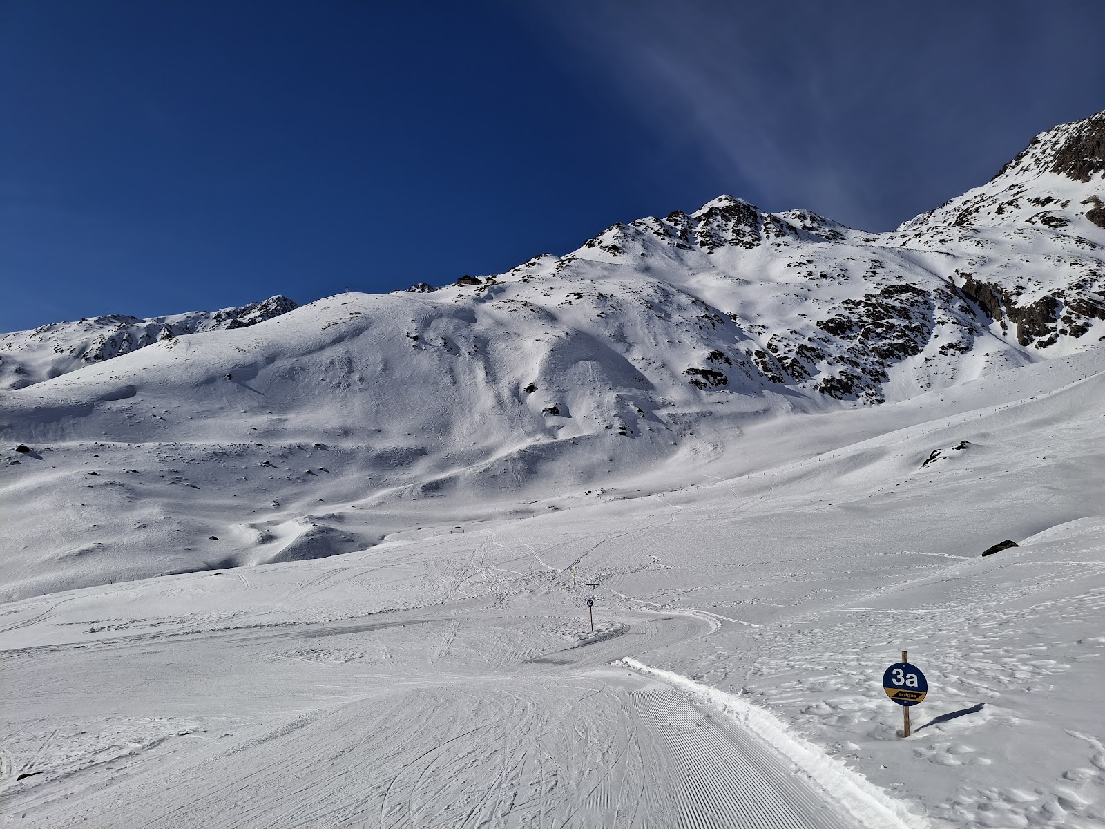 Ski tourers ascending toward the high glacier country above Vent
