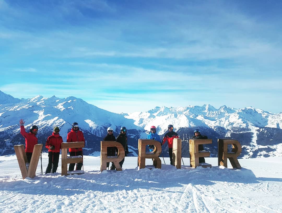 Chalets and the mountain backdrop on a clear day in Verbier