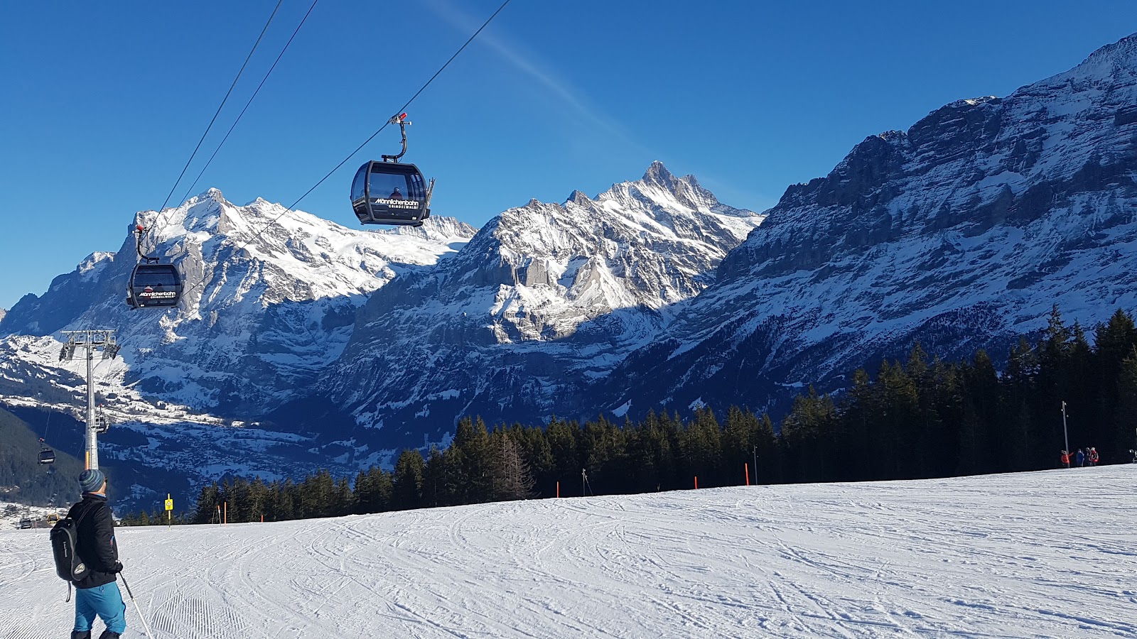 Snow covered chalets and peaks around Wengen in soft light