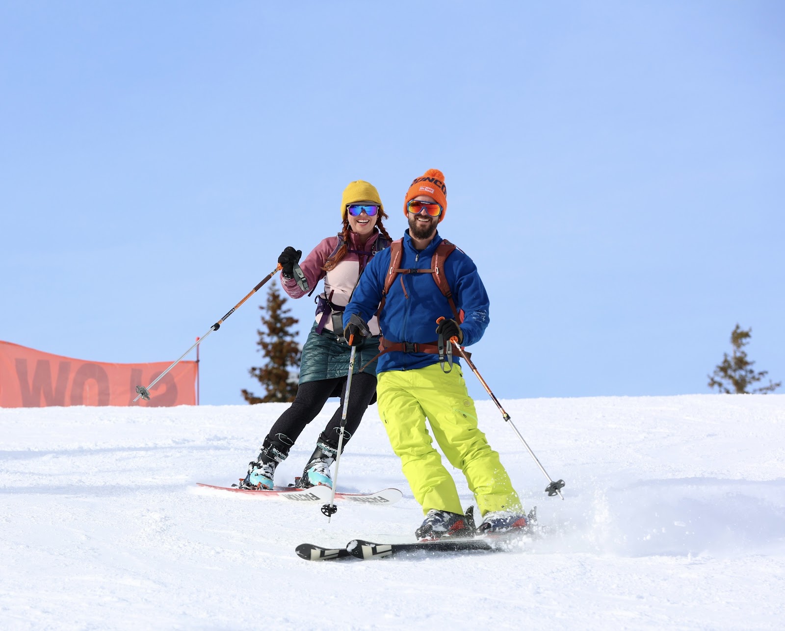 Children learning to ski on a gentle groomed slope