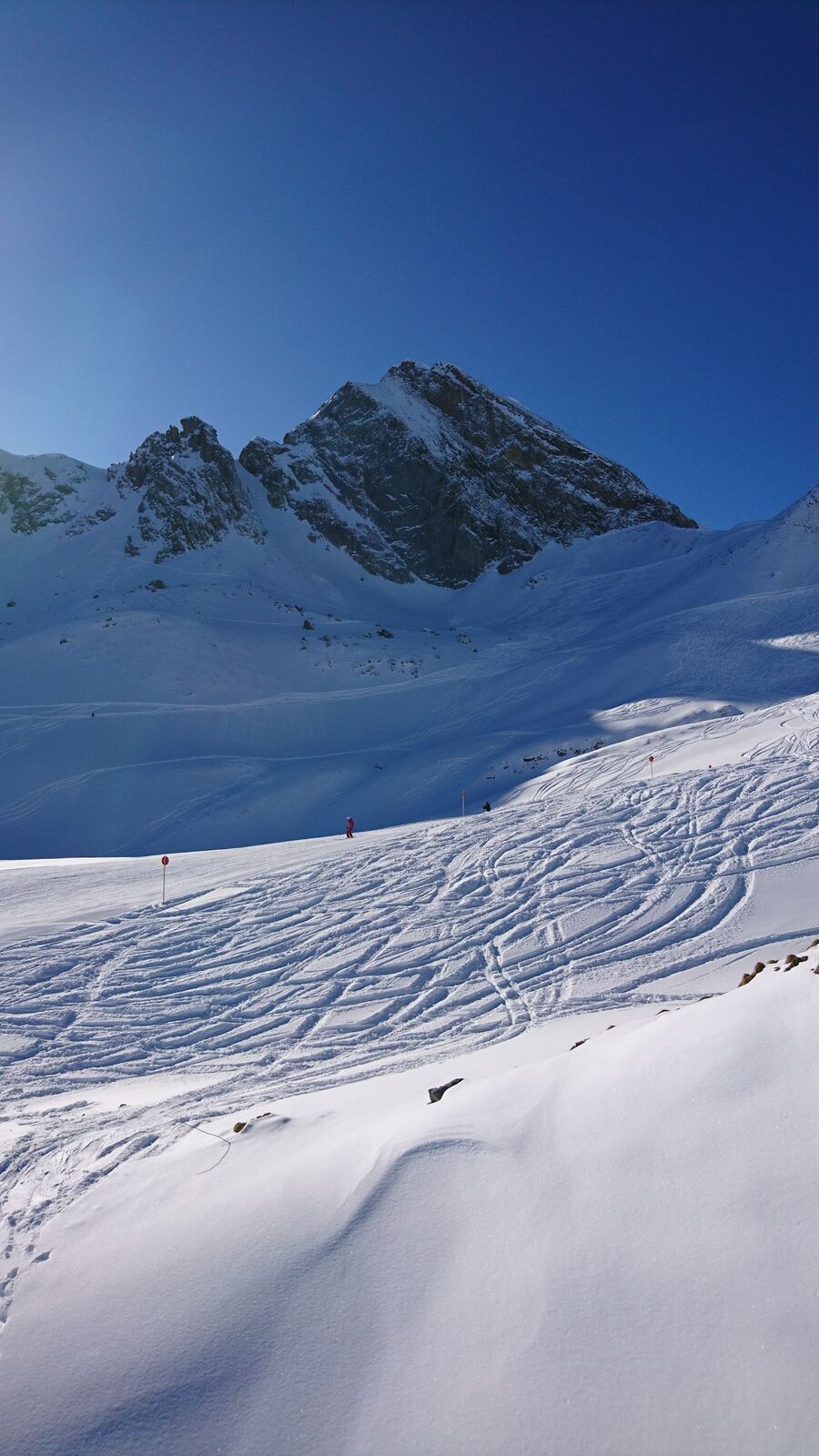 Smart hotels lining the snowy road through Zurs